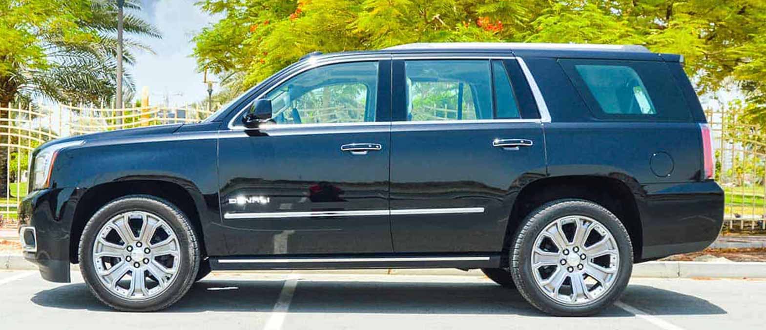 GMC Yukon Black interior and exterior views - Image 1