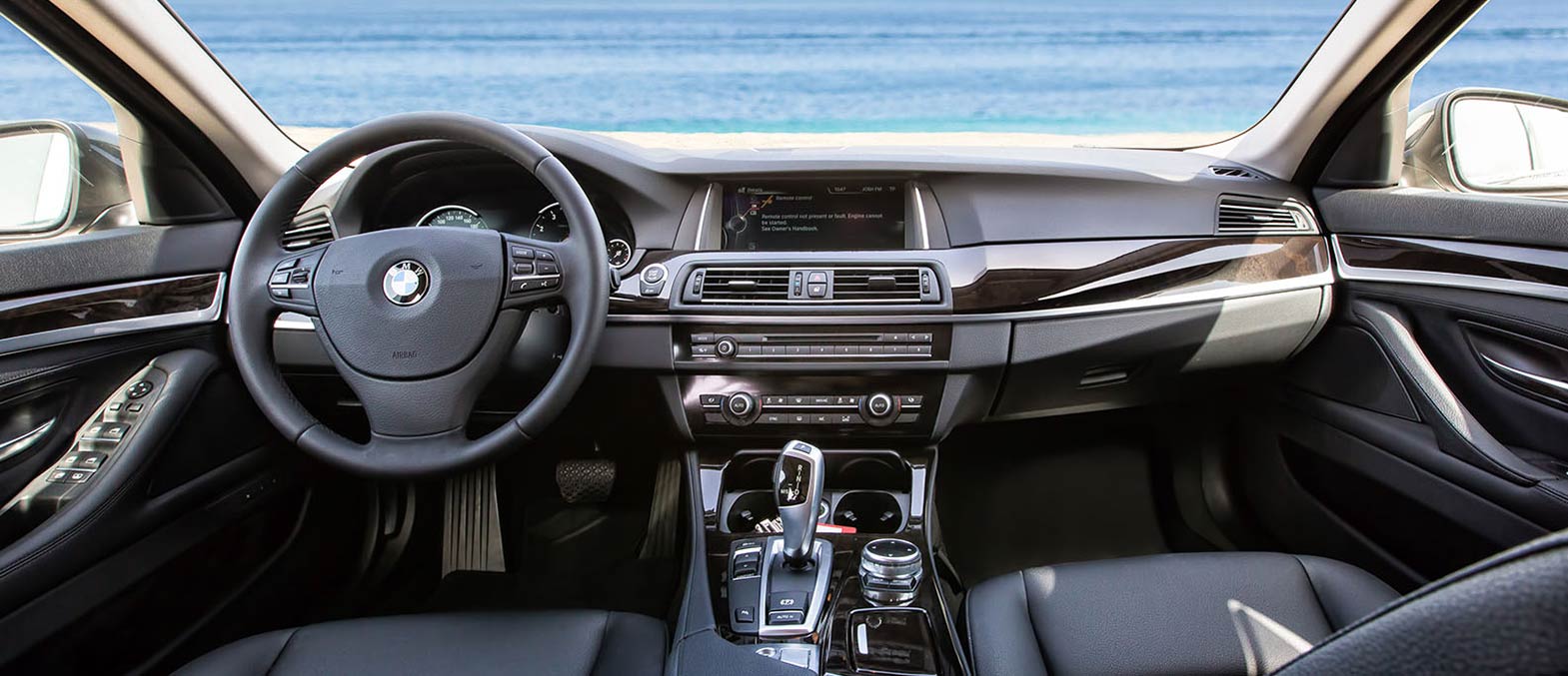 BMW 5 Series interior and exterior views - Image 3