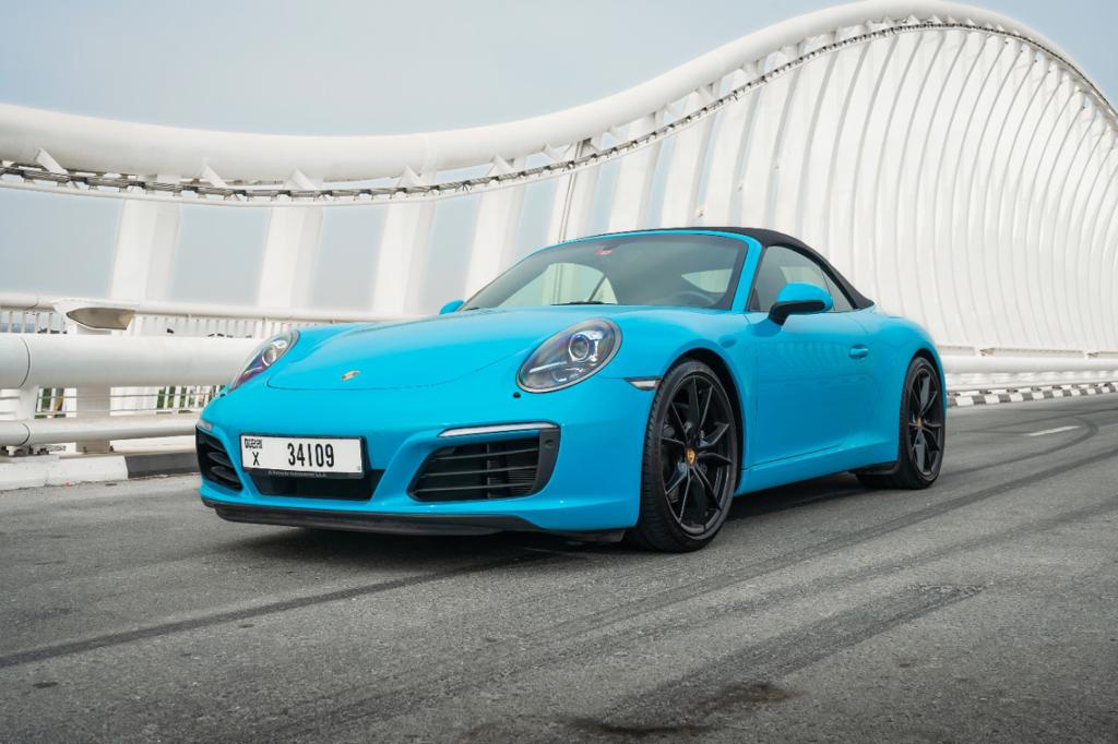 Porsche 911 Carrera Cabrio interior and exterior views - Image 1
